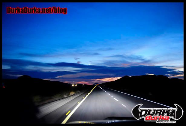 The sky lights up after the sun sets while Westbound on I-10