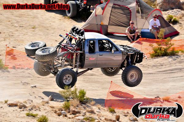 A spectator jumps The Rockpile before the race.