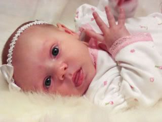 IMAGE: http://i43.photobucket.com/albums/e370/christyjo2/kyli6weeks1.jpg