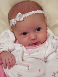 IMAGE: http://i43.photobucket.com/albums/e370/christyjo2/kyli6weeks5.jpg