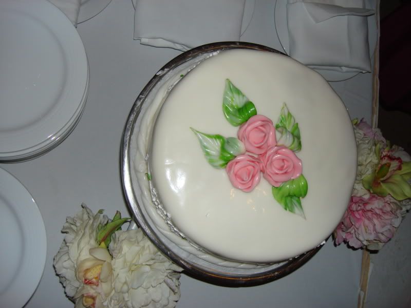 wedding cakes with flowers on top. Here is a picture of our cake.