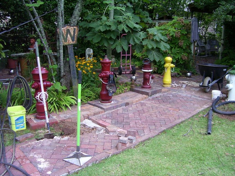 http://i43.photobucket.com/albums/e386/brickpaver/back%20sidewalk%20expansion.jpg
